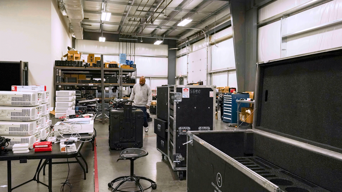 Timelapse GIF of Will Sanders, Centrifuge Media Operation and Logistics Manager, in the HQ warehouse packing and documenting inventory for a FedEx pickup.